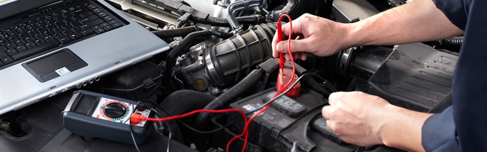 Automotive engine diagnostics and repair service